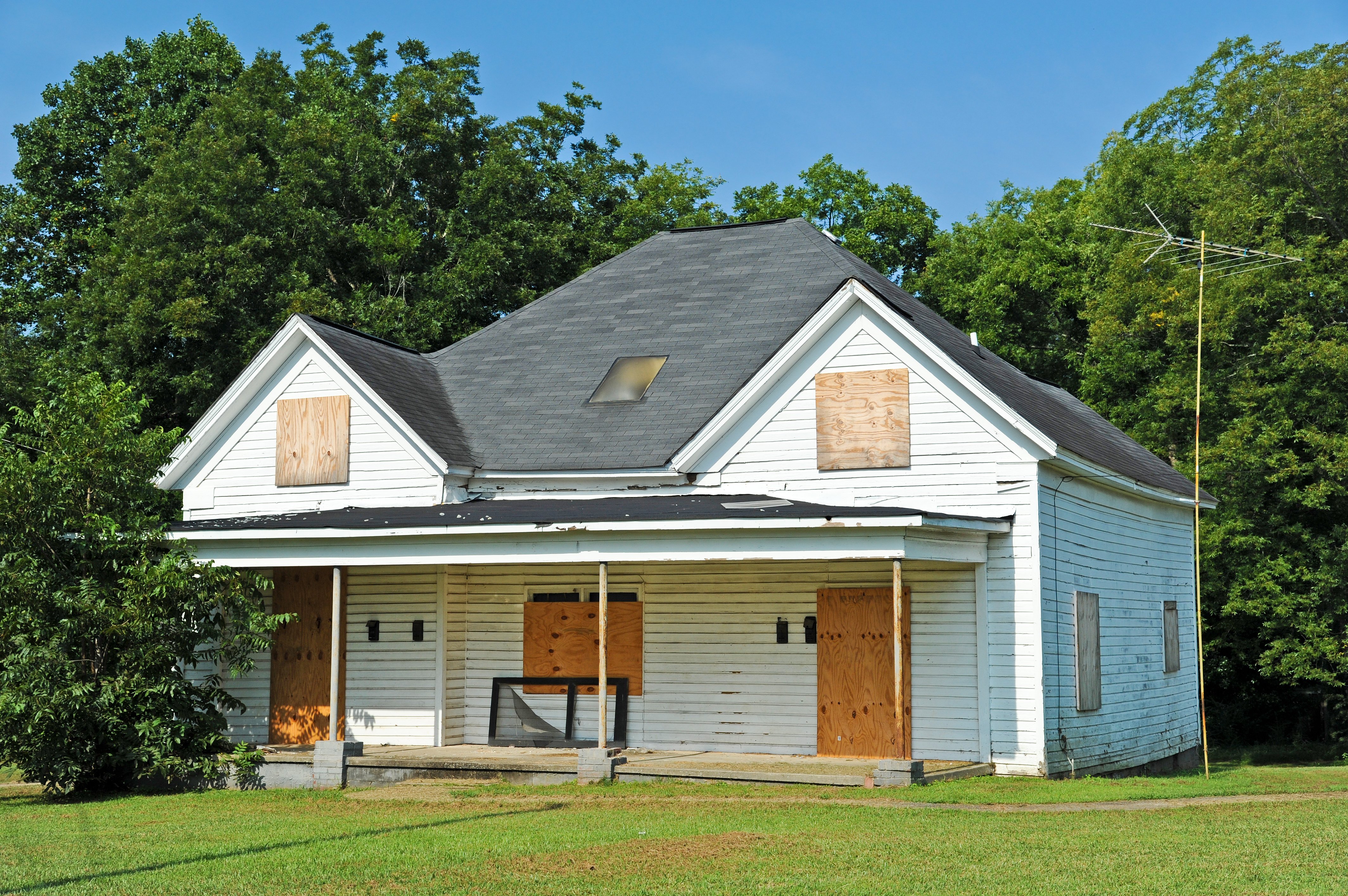 Abandoned House with Boarded up Windows