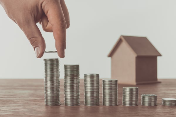 Investment Property, growing stack of coins 