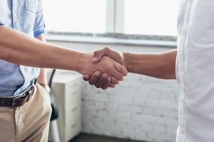 shaking hands to a deal