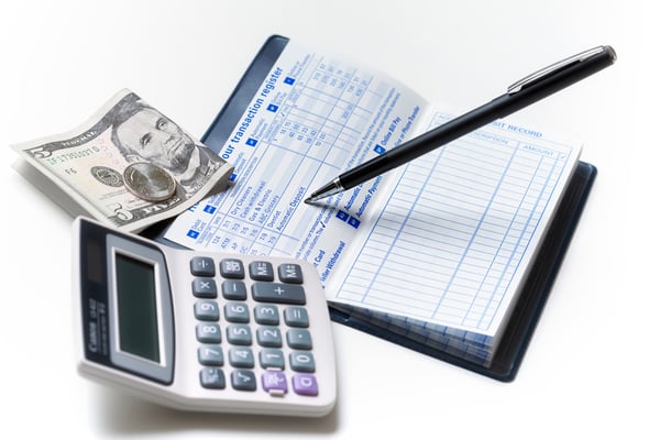 Bankbook with calculator and change
