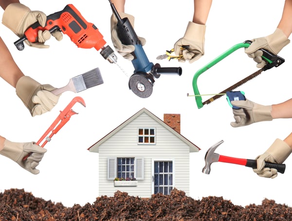 Variety of tools surrounding a house