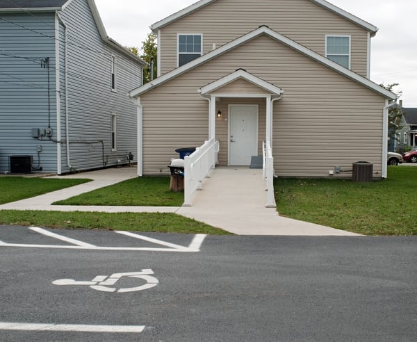 handicap accessible property with ramp and reserved parking