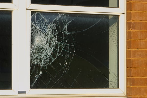 A broken window on a house