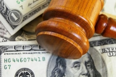Cash Deposit, gavel on top of cash