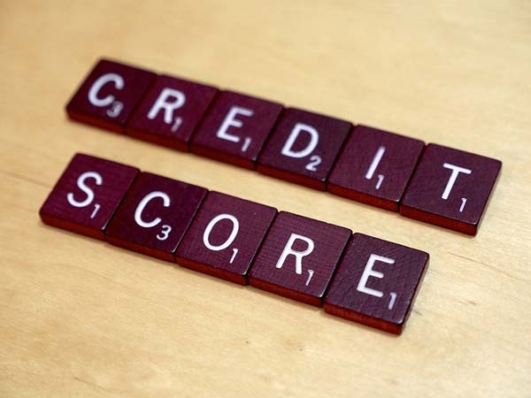 credit score spelled in scrabble tiles