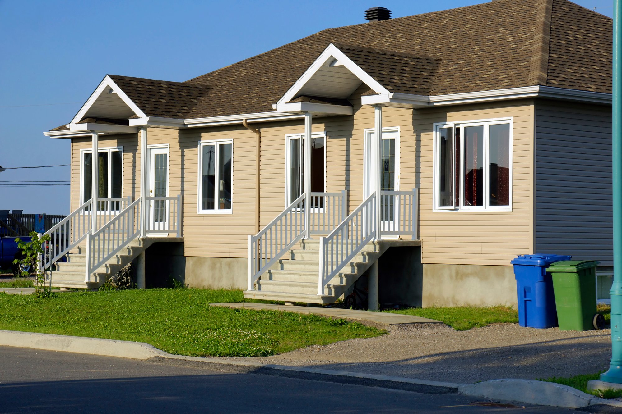 New duplex in beige siding