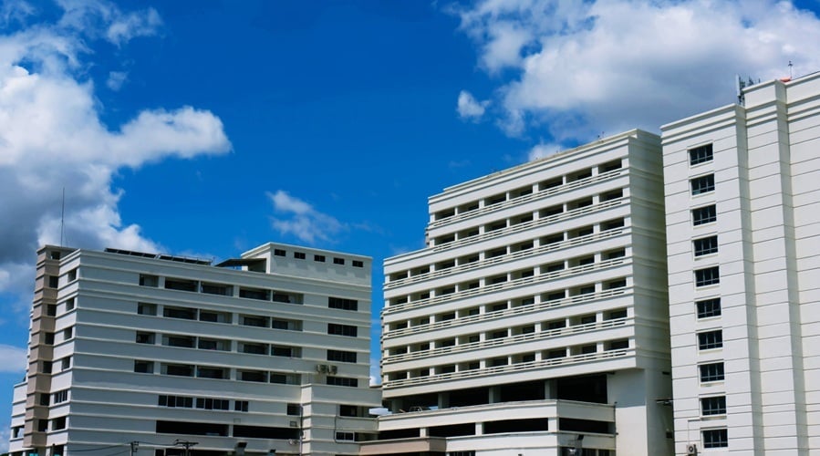 Building with clouds and blue sky 2