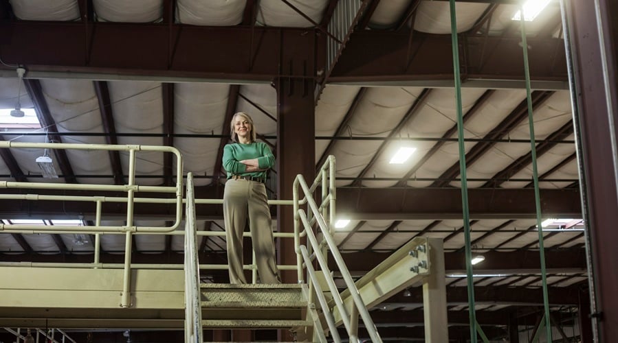 female executive in a warehouse distibution facility