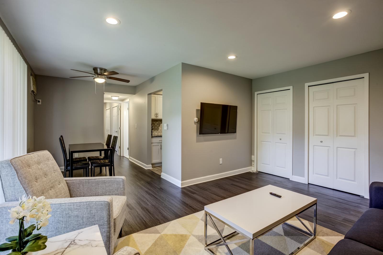 Living room toward dining and hallway