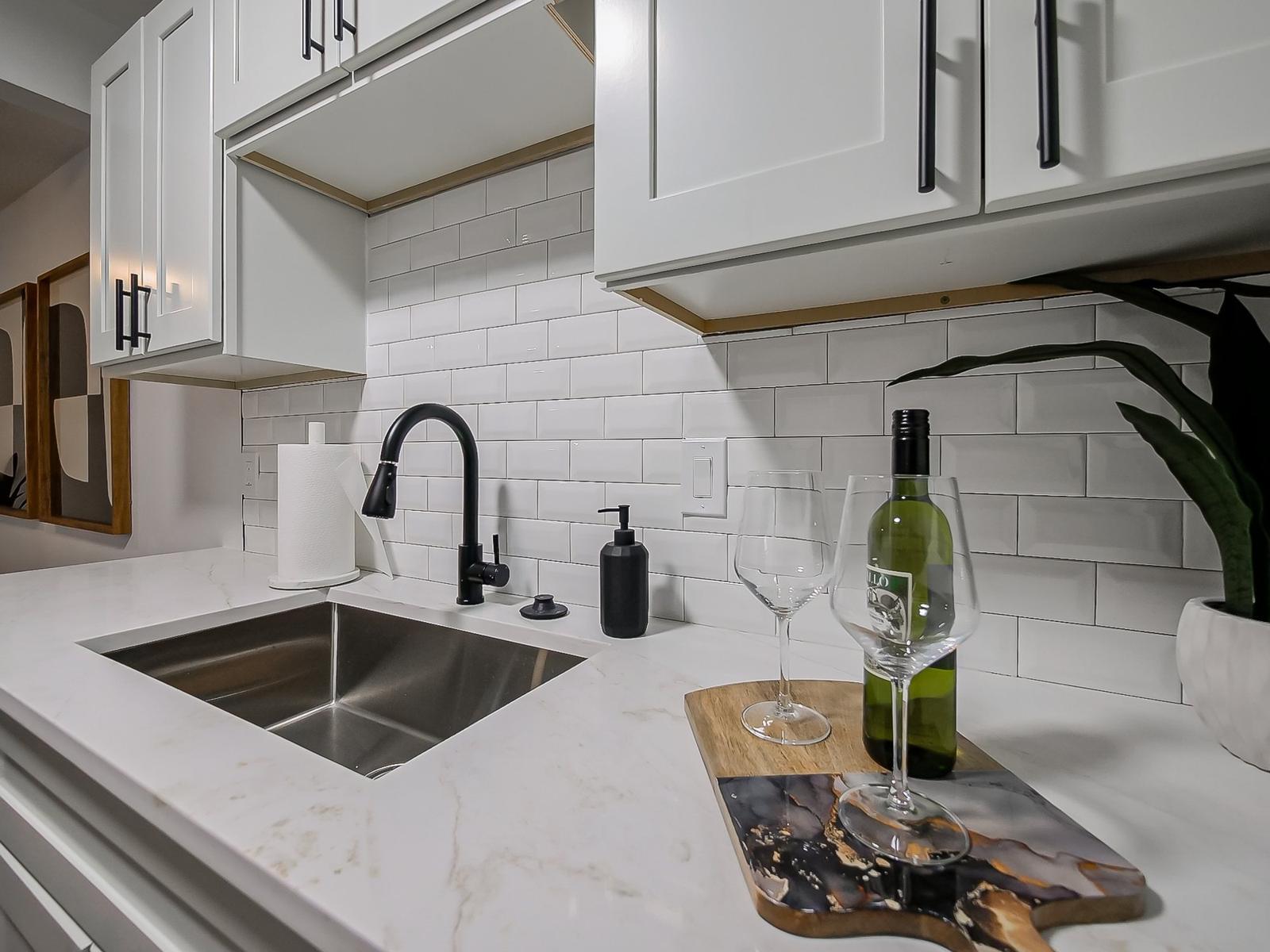 Kitchen sink and quartz counter